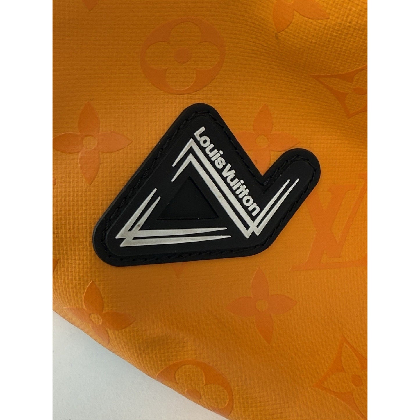 Louis Vuitton Ski Monogram Storm Coated Orange Canvas Keepall Sport