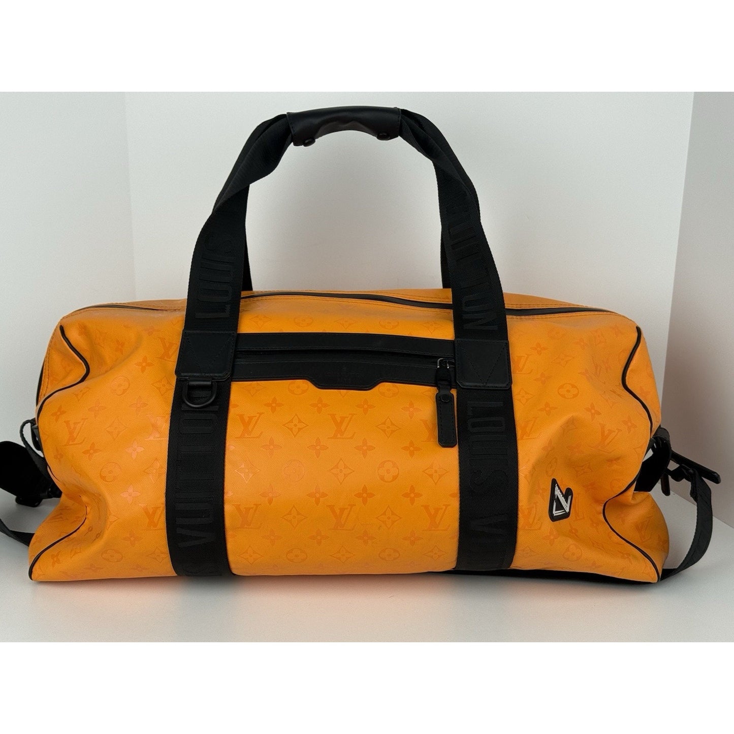 Louis Vuitton Ski Monogram Storm Coated Orange Canvas Keepall Sport