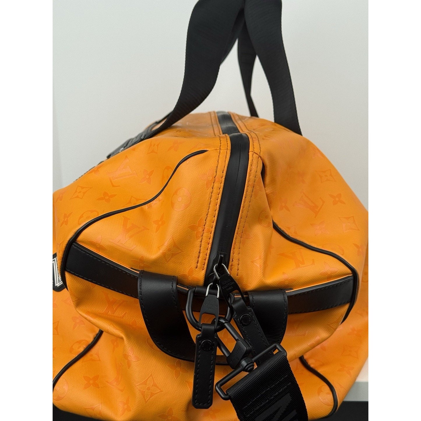 Louis Vuitton Ski Monogram Storm Coated Orange Canvas Keepall Sport