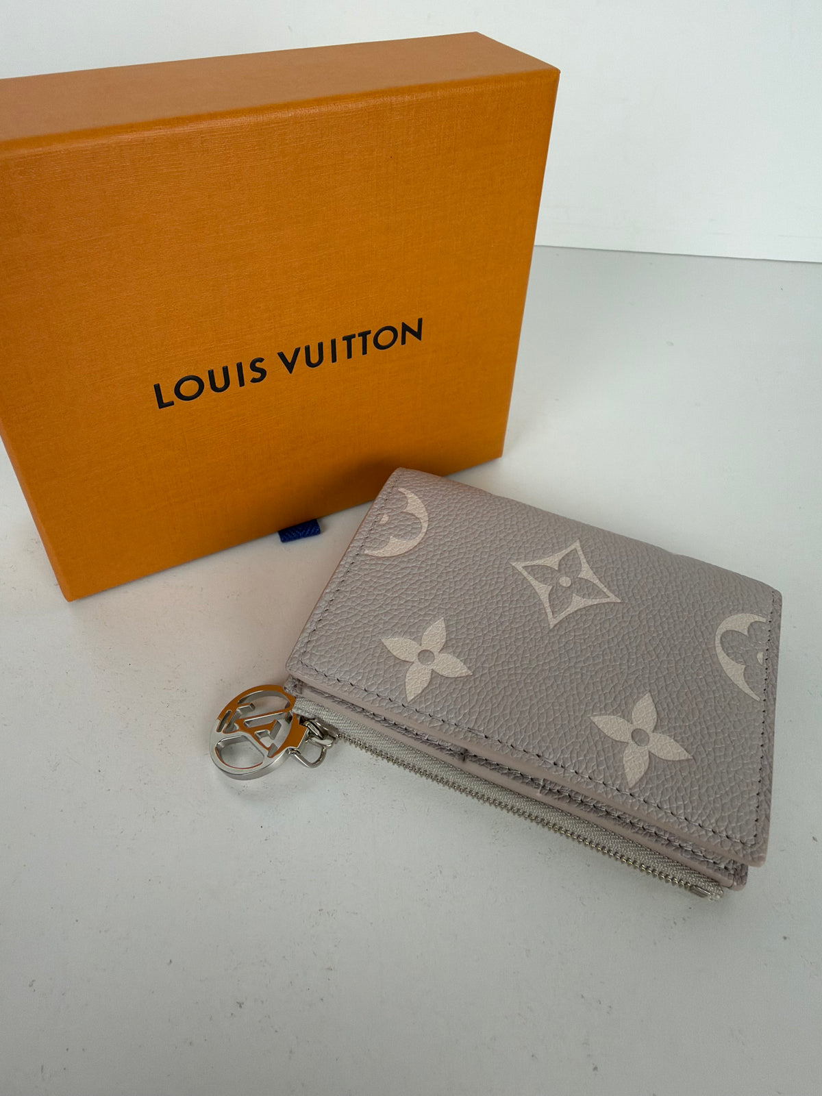 Louis Vuitton Lisa Wallet in Dust Pink Empreinte Leather NFC K-3
