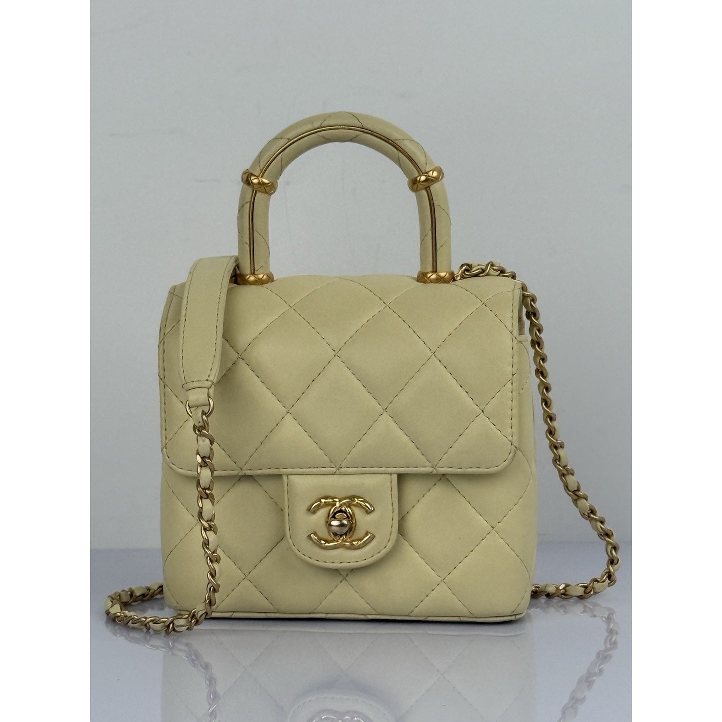 CHANEL Crush Quilted Leather Mini Top Handle Flap Bag in Yellow