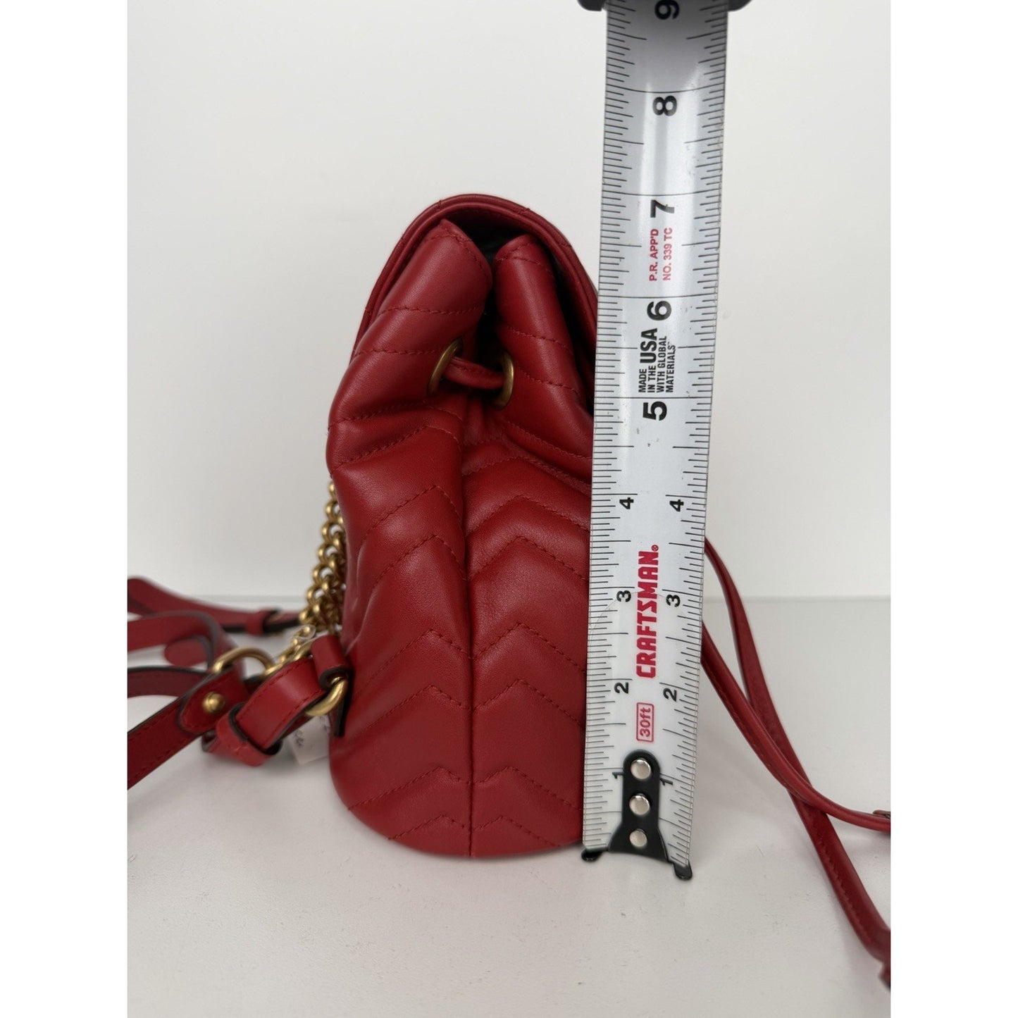 Gucci Marmont Drawstring Mini Backpack Matelasse Leather Red