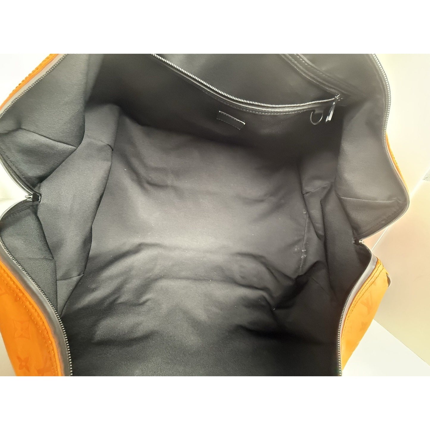 Louis Vuitton Ski Monogram Storm Coated Orange Canvas Keepall Sport