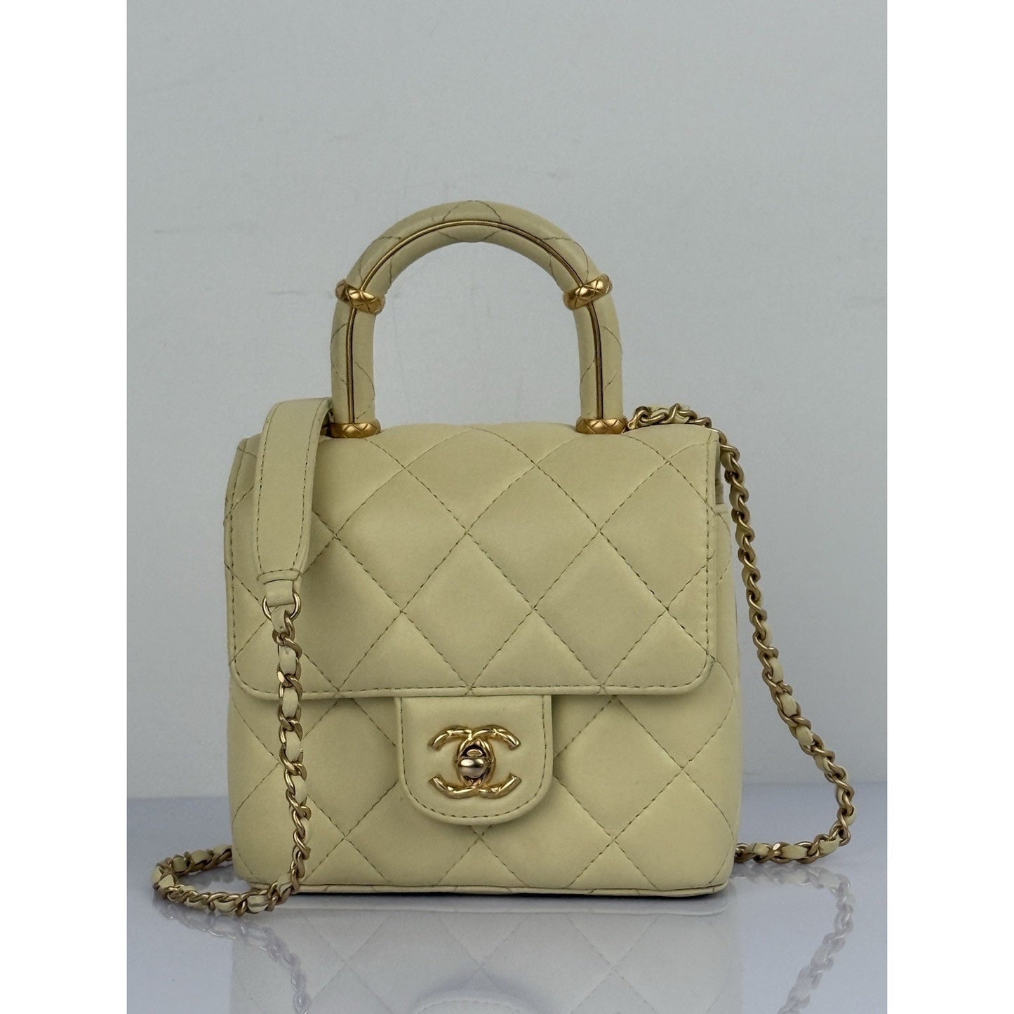 CHANEL Crush Quilted Leather Mini Top Handle Flap Bag in Yellow