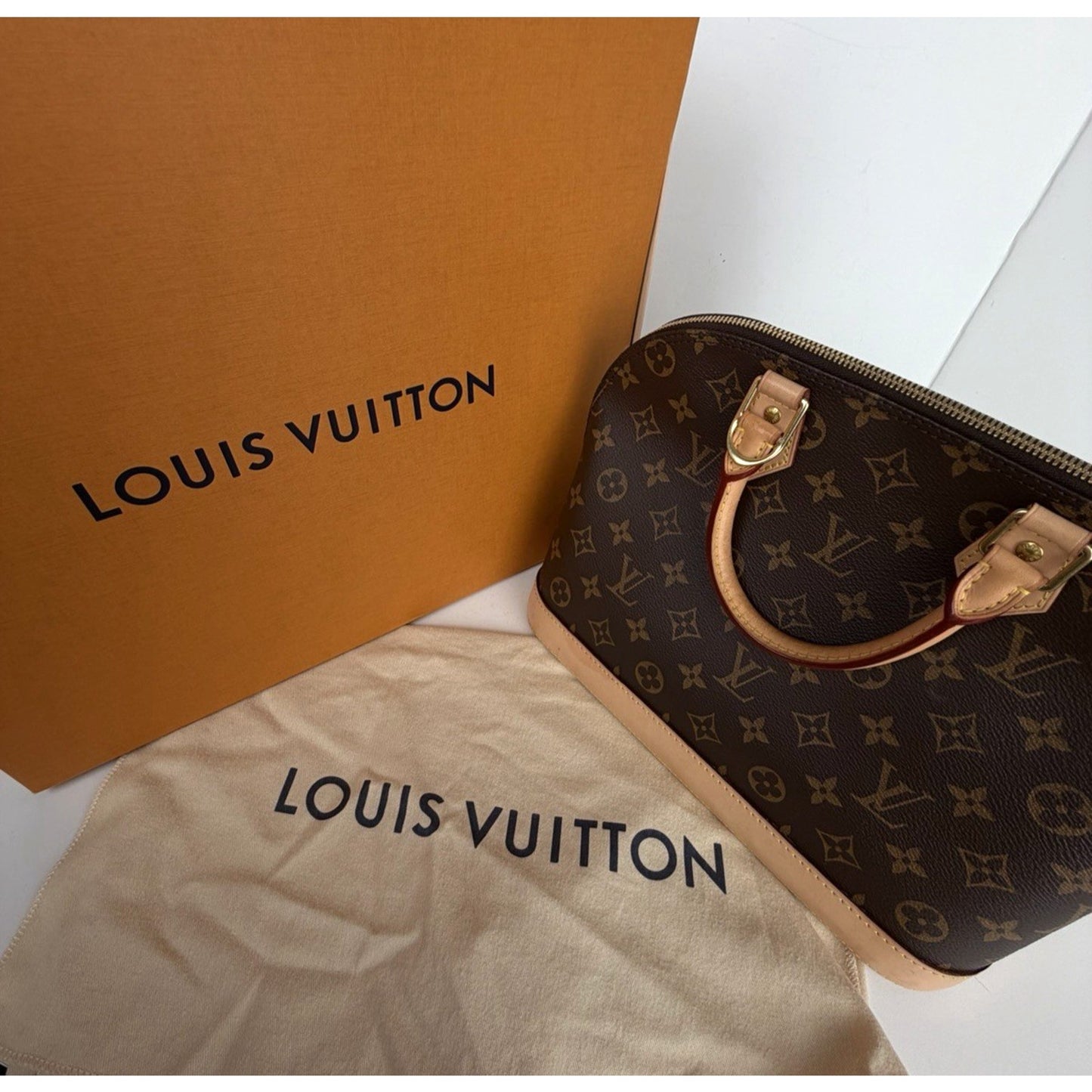 Louis Vuitton Alma PM Bag in Brown Coated Canvas with Leather Trim NFC S