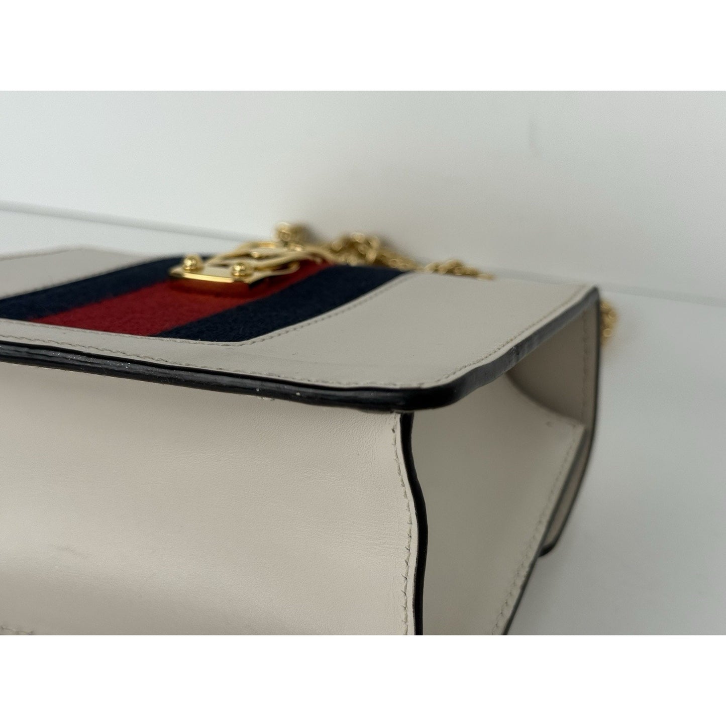 Gucci Sylvie White Leather Shoulder Bag with Gold Chain Detail