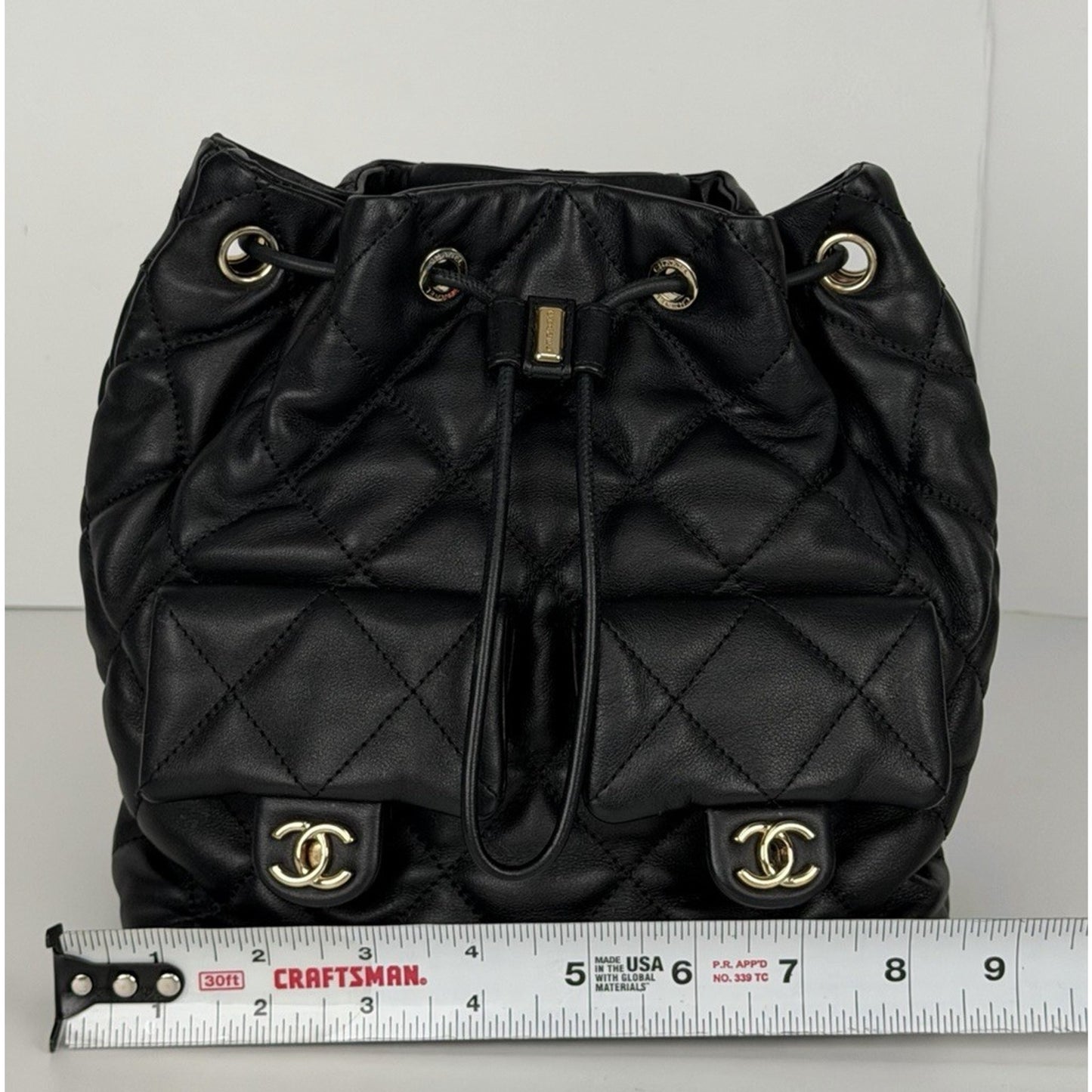Chanel Double Pocket Drawstring Backpack F1