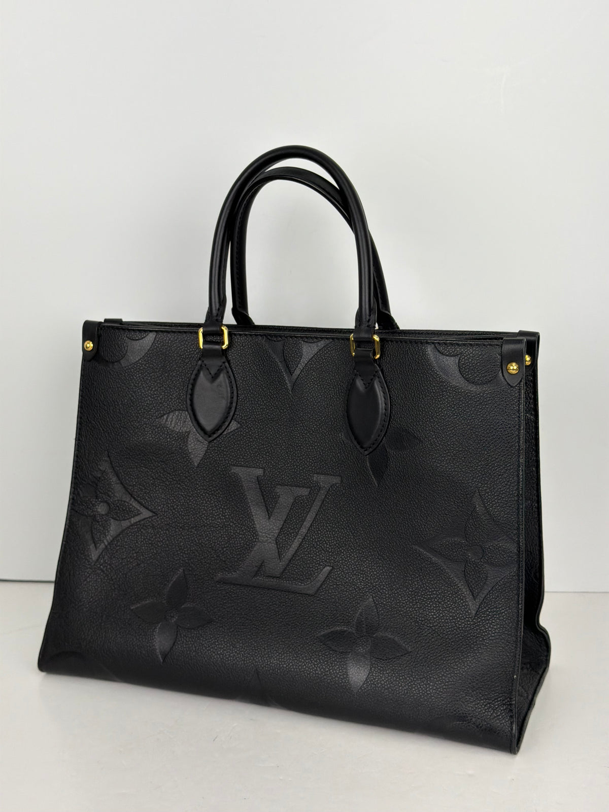 Louis Vuitton OnTheGo Tote Bag MM in Black Giant Monogram Empreinte Leather NFC YC5