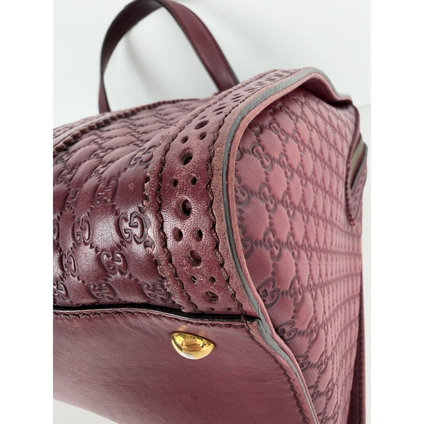 Gucci Duilio Brogue Boston Bag in Burgundy Microguccissima Embossed Leather S-16