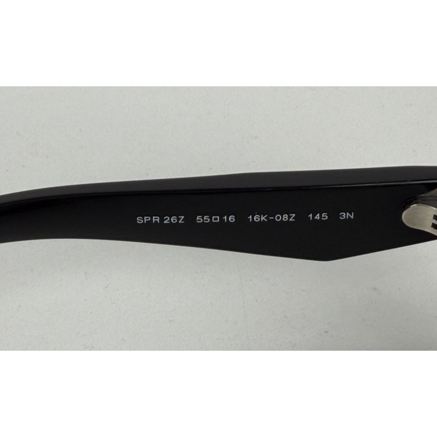 Prada Symbole Oval Car-Eye Sunglasses 55 in Black with Dark Gray Lenses