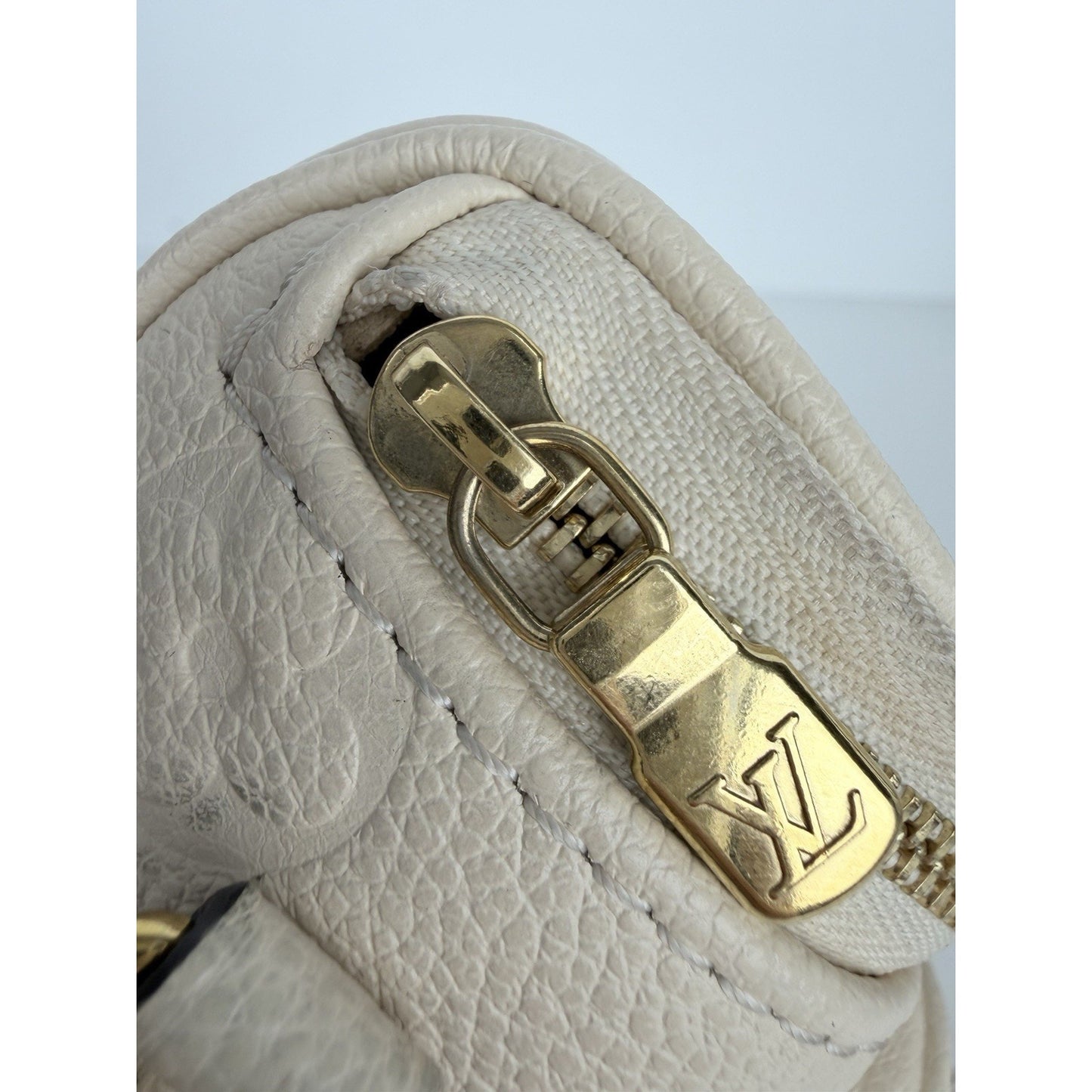 Louis Vuitton Mini Bumbag in Cream Embossed Monogram Empreinte Leather NFC U1