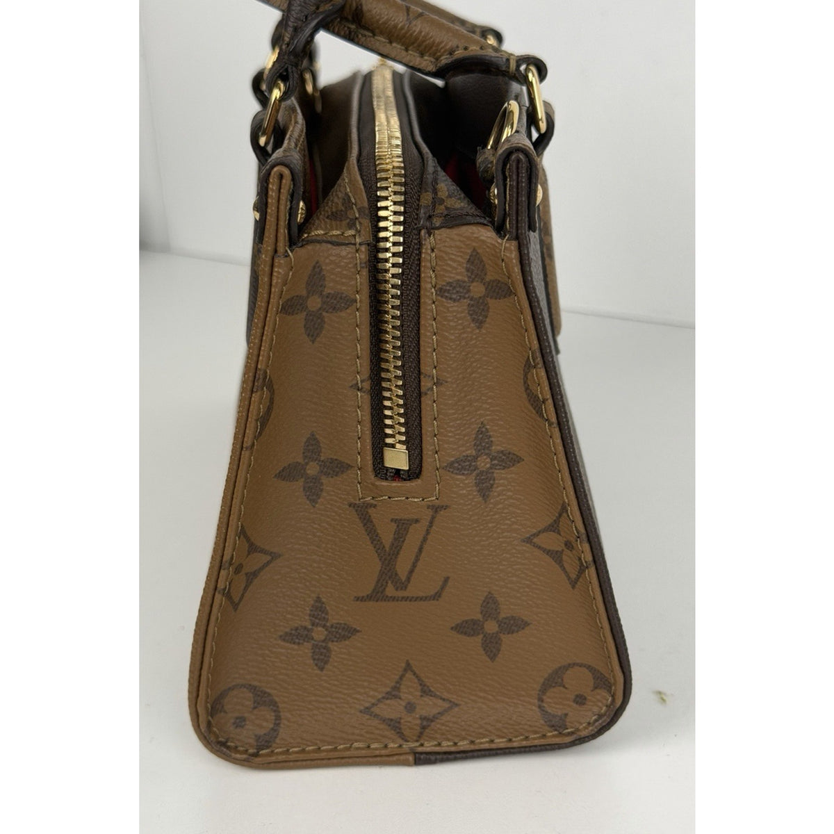 Louis Vuitton OnTheGo East West HandBag Monogram Reverse Brown Canvas NFC E2