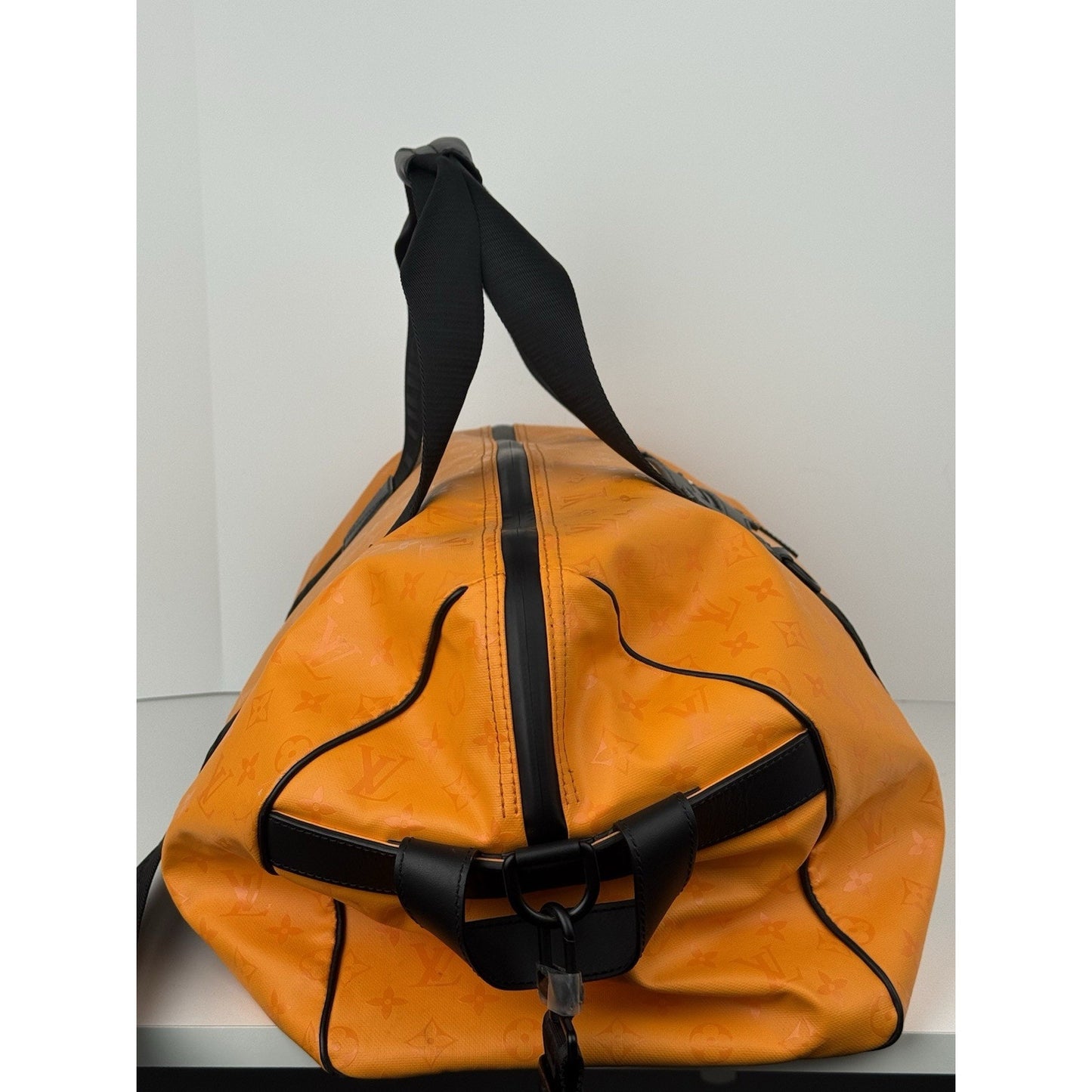 Louis Vuitton Ski Monogram Storm Coated Orange Canvas Keepall Sport