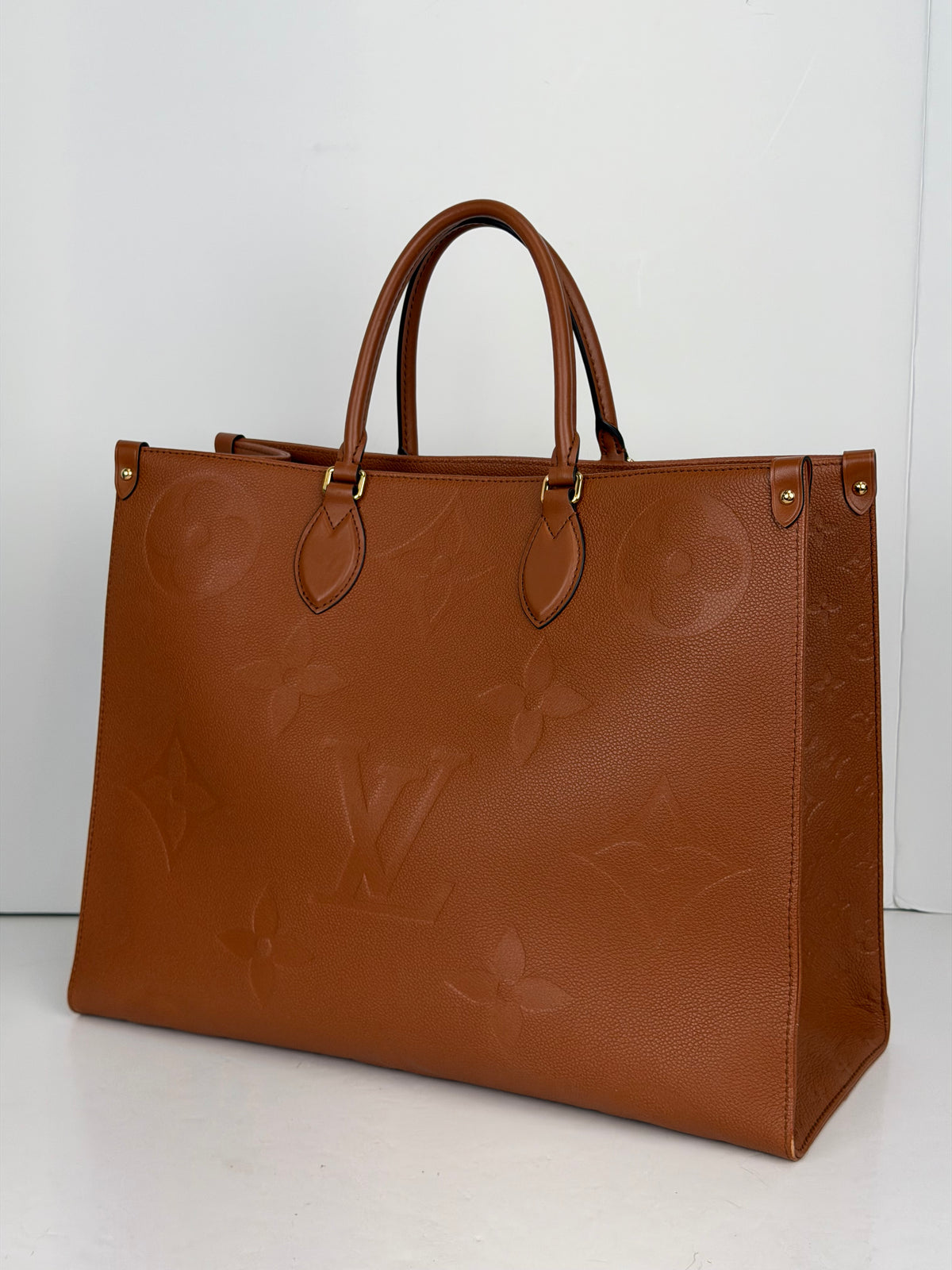 Louis Vuitton Onthego GM Tote Bag in Cognac Giant Monogram Empreinte Leather YC7