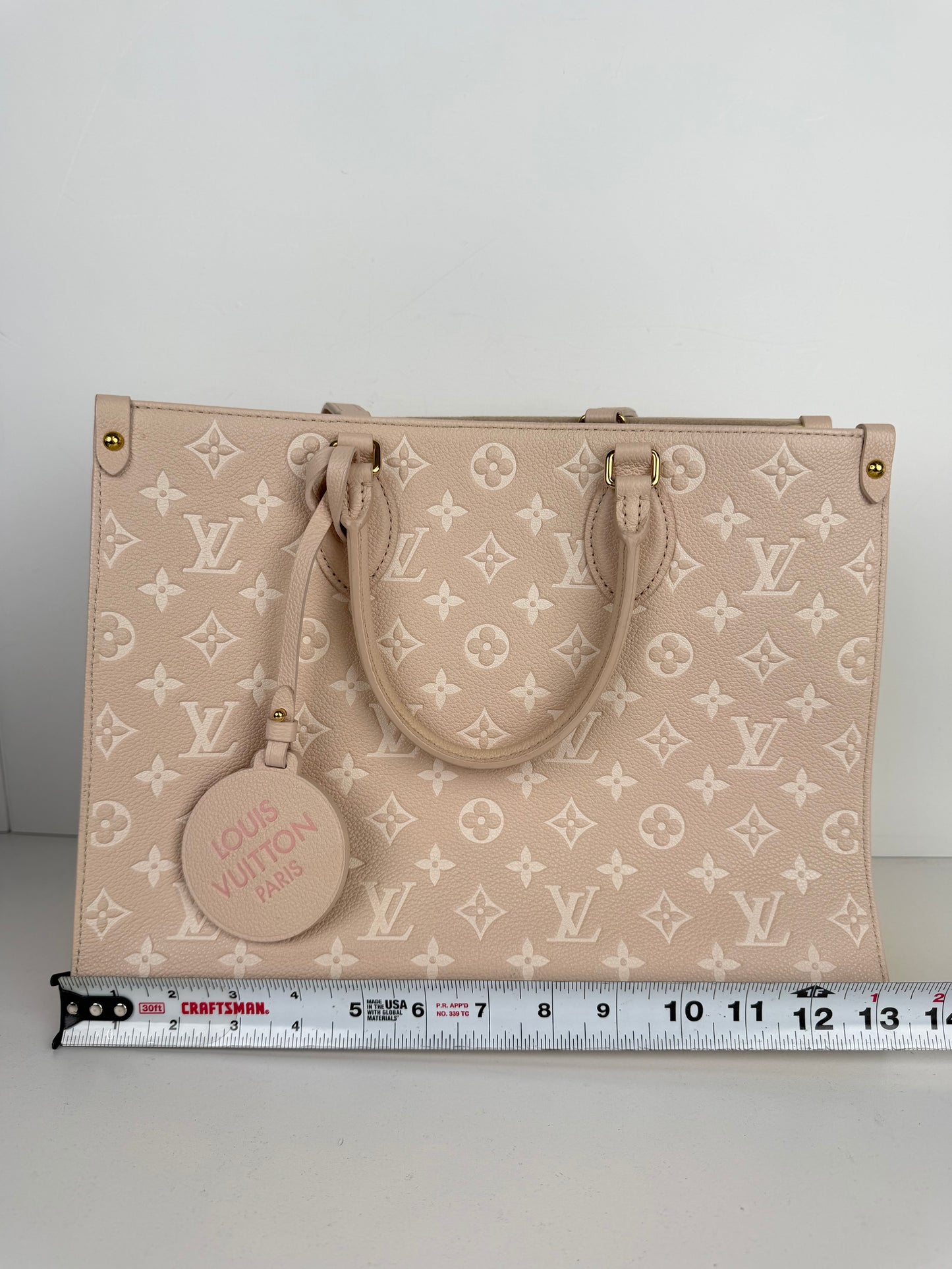 Louis Vuitton OnTheGo Spring in the City MM Tote Bag in Beige Empreinte Leather NFC C-9