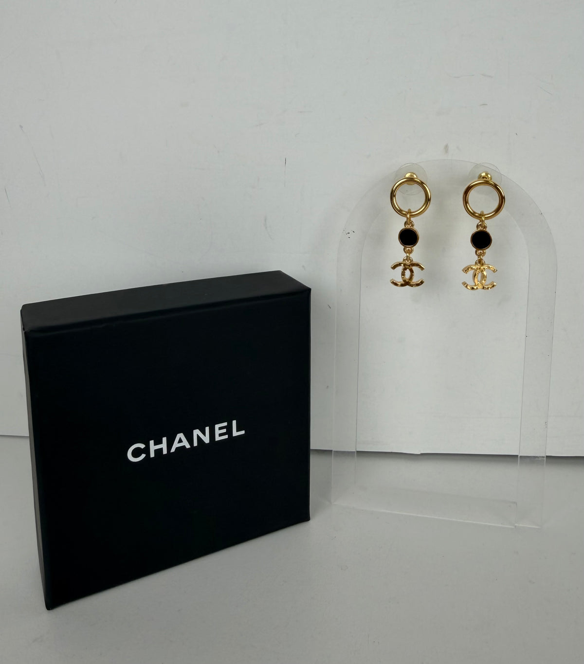 Chanel Metal Resin Disc CC Long Drop Earrings in Gold and Black K1