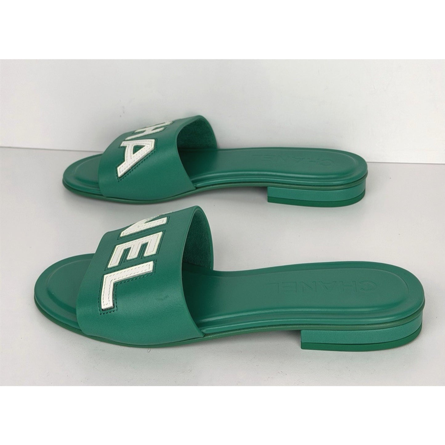 Chanel Mules in Emerald Green Leather with Logo Lettering 36 EU (5.5-6 US)