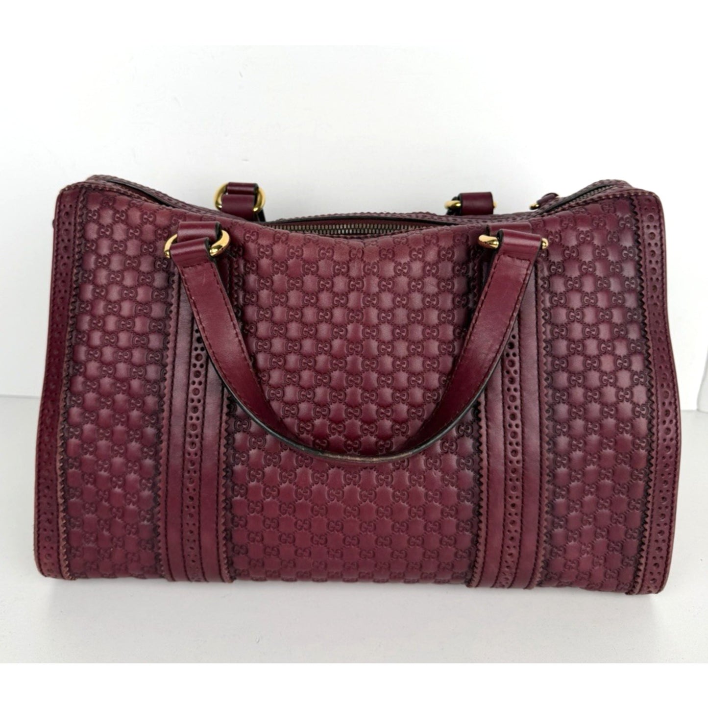 Gucci Duilio Brogue Boston Bag in Burgundy Microguccissima Embossed Leather S-16