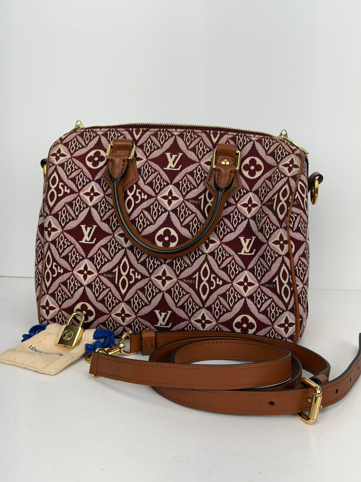 Louis Vuitton "Since 1854" Speedy Bandouliere 25 Handbag in Burgundy Monogram Jacquard 2020 YC8