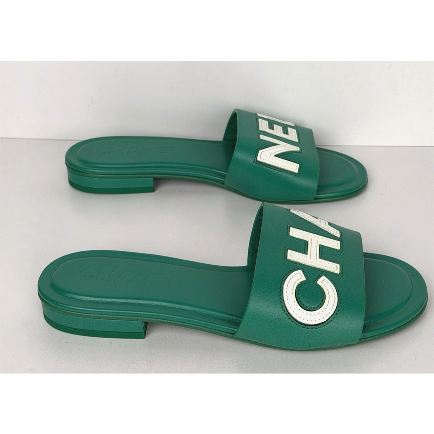 Chanel Mules in Emerald Green Leather with Logo Lettering 36 EU (5.5-6 US)