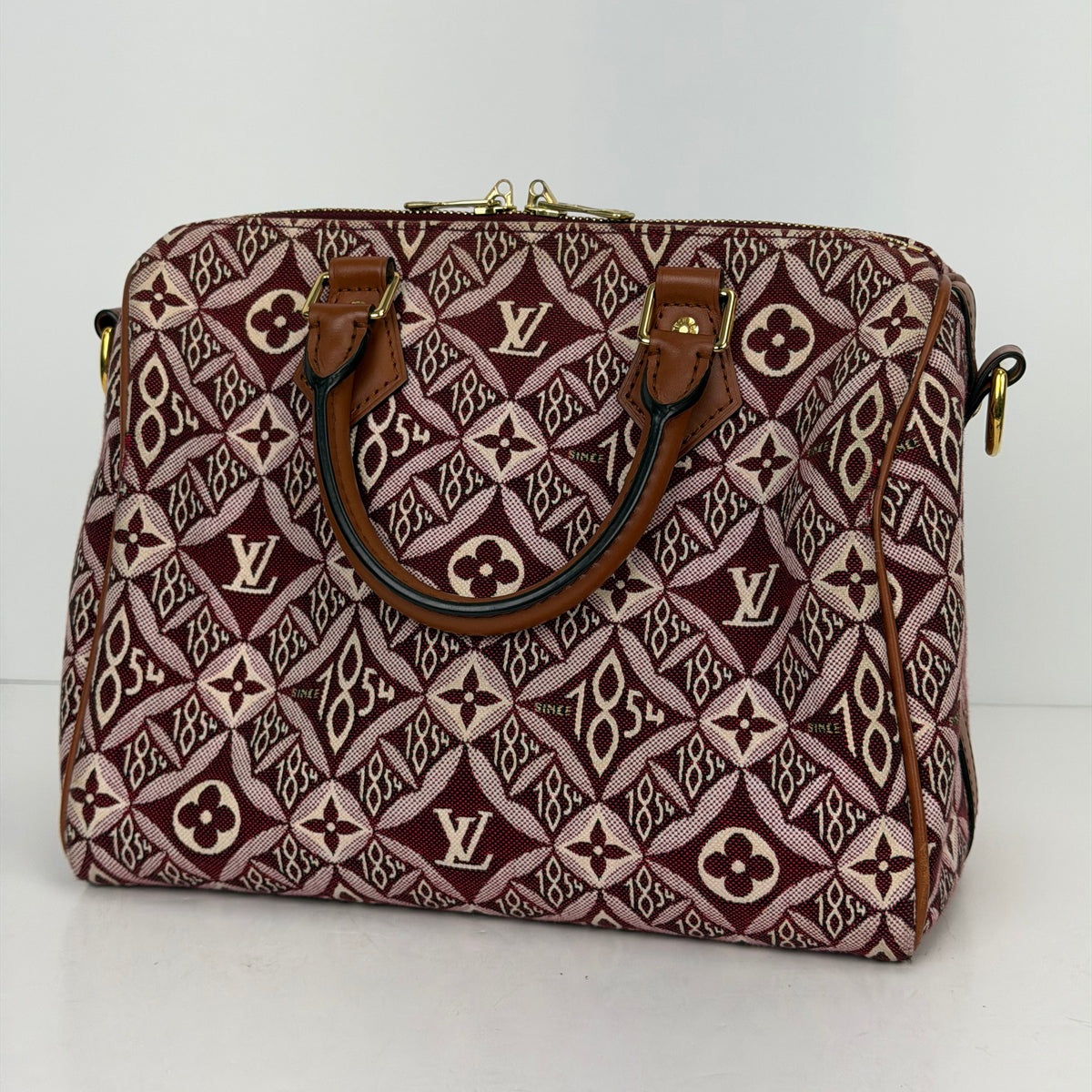 Louis Vuitton "Since 1854" Speedy Bandouliere 25 Handbag in Burgundy Monogram Jacquard 2020 YC8