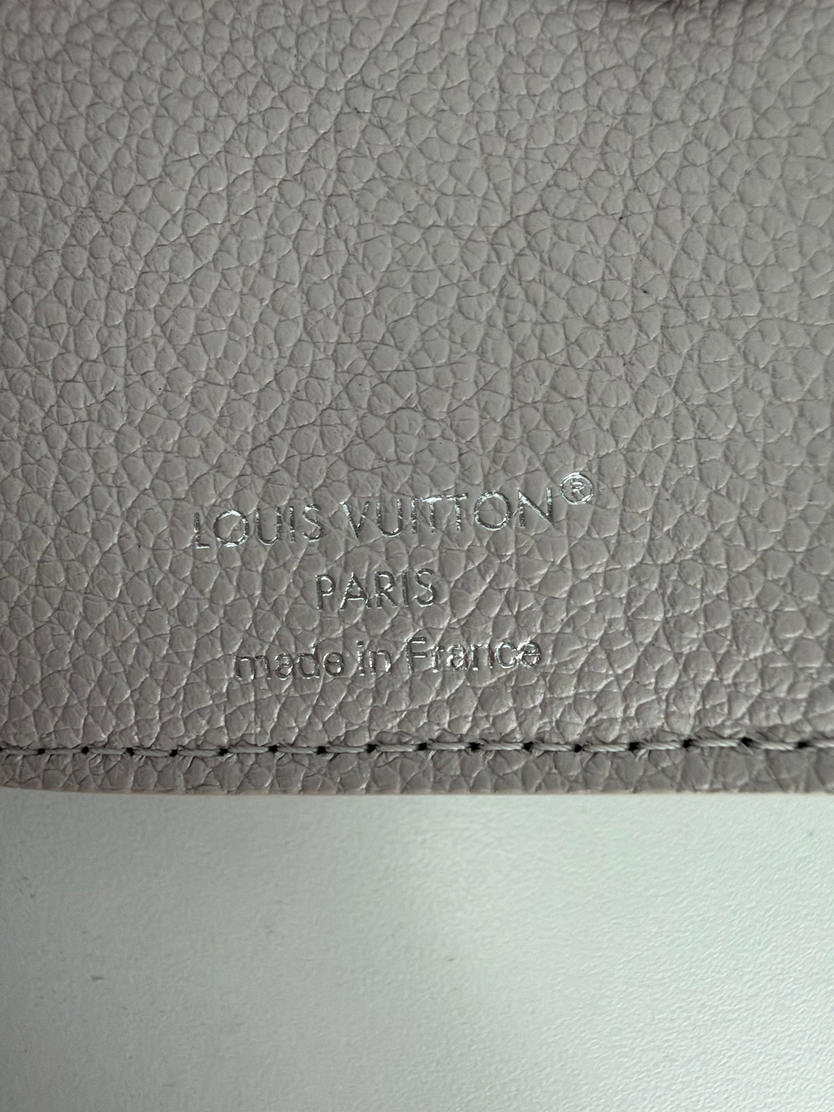 Louis Vuitton Lisa Wallet in Dust Pink Empreinte Leather NFC K-3