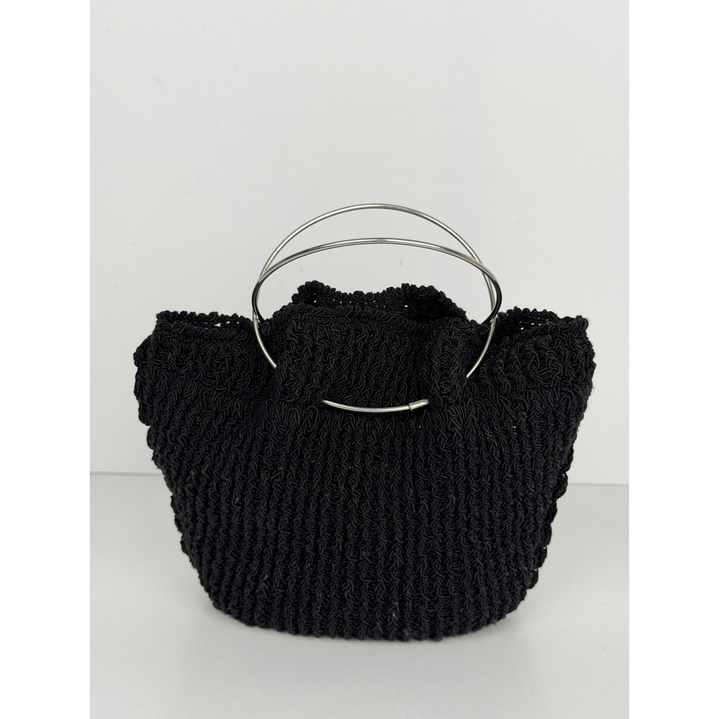 The Row Flat Micro Circle Bag in Black S08