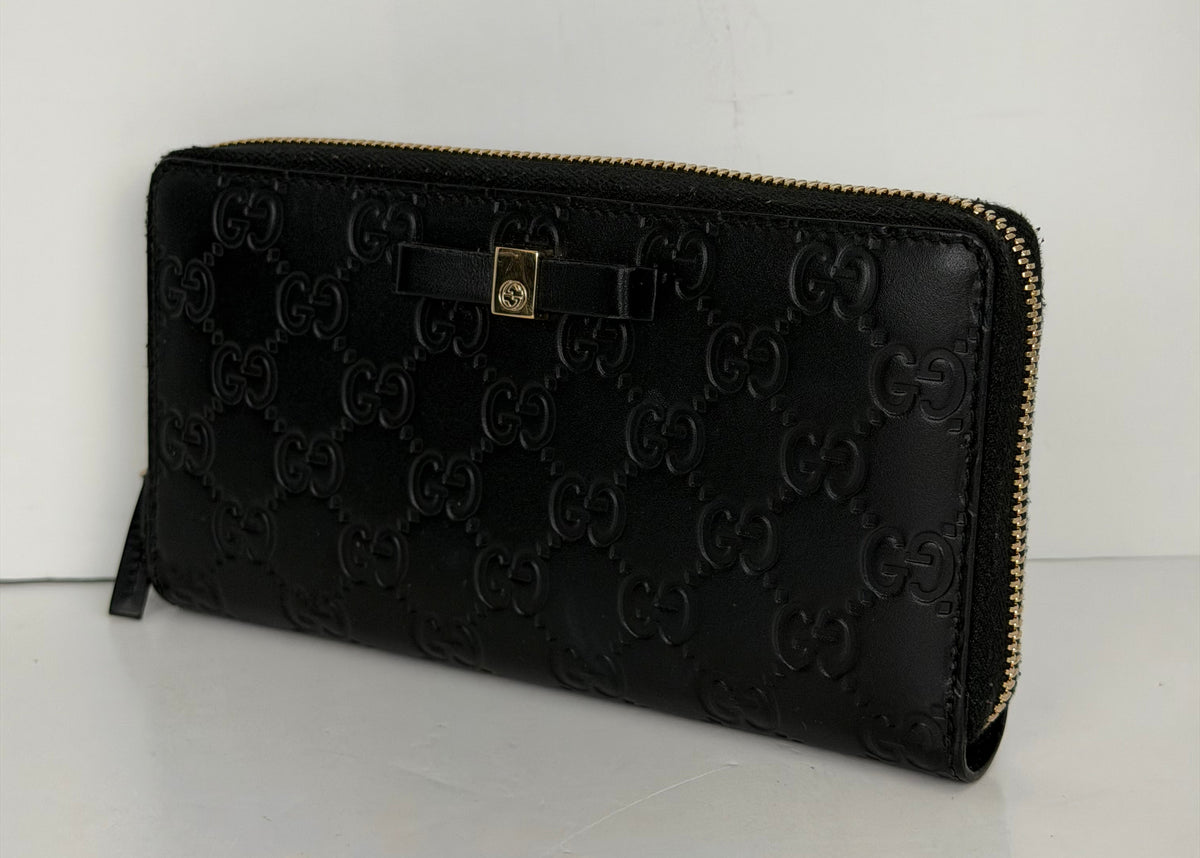 Gucci Guccissima Bow Zip Around Wallet in Black Leather Y