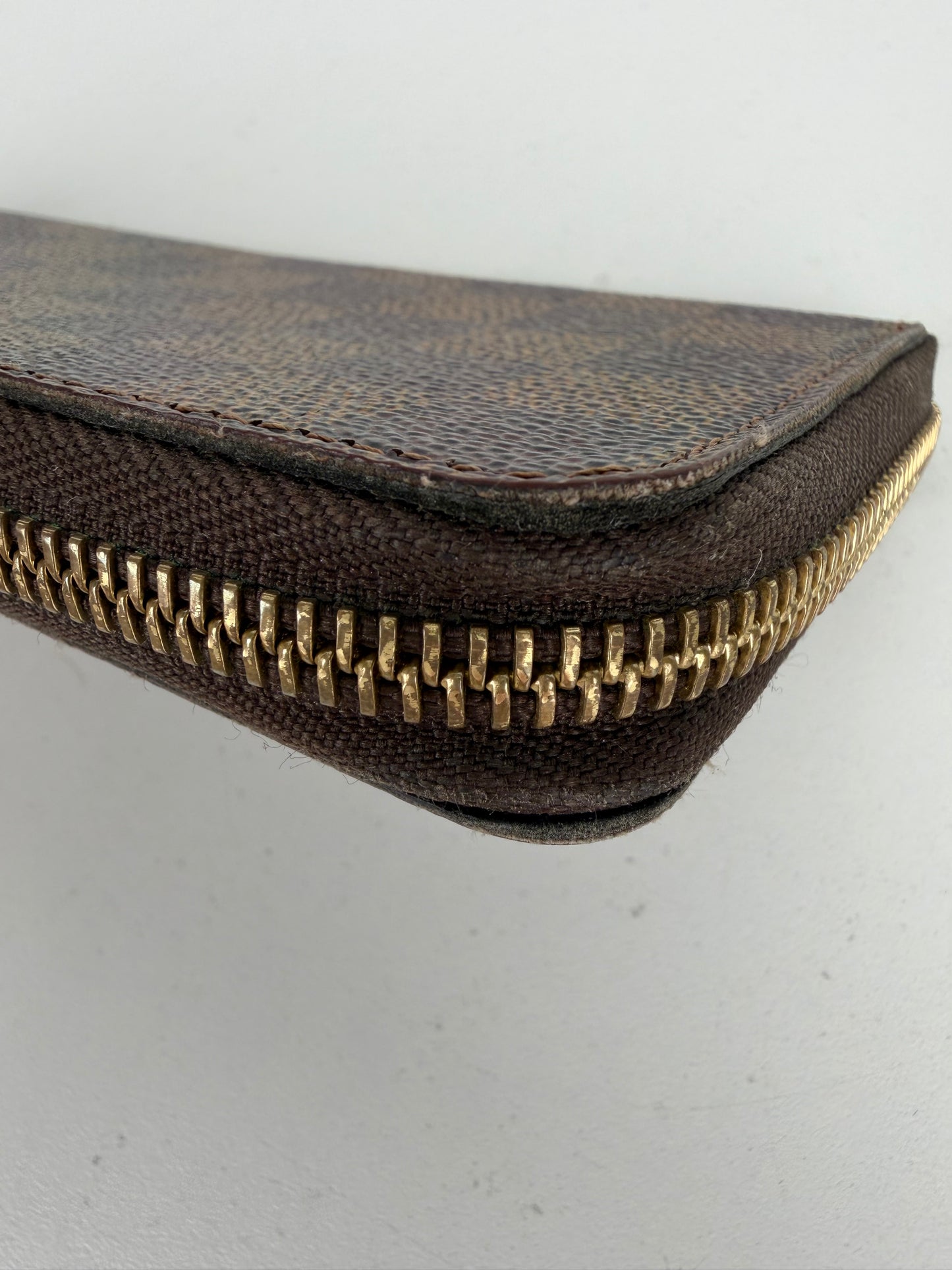 Louis Vuitton Clemence Zippy Wallet in Damier Ebene Coated Canvas 2019 Y