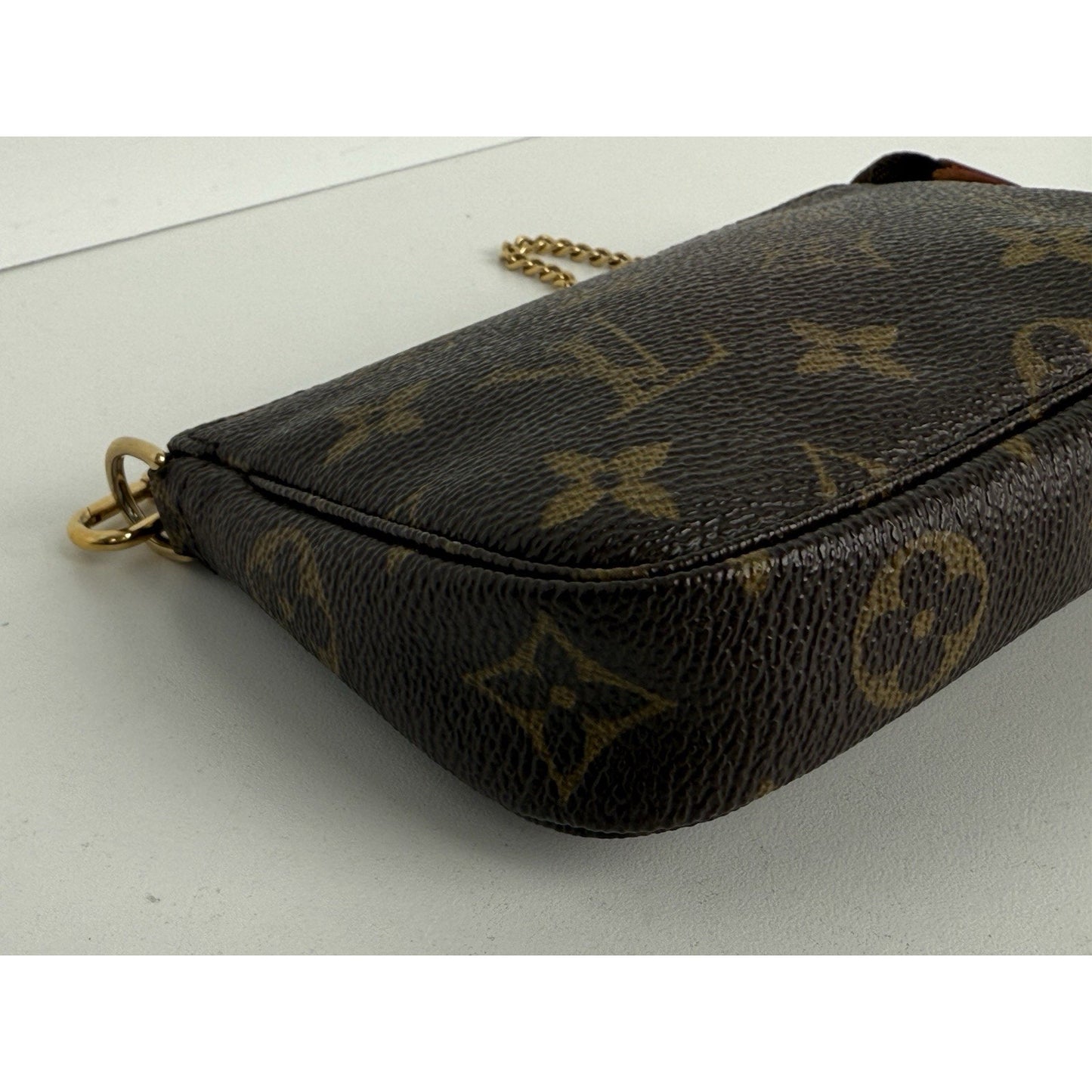 Louis Vuitton Mini Pochette Accessoires Monogram Canvas Brown with Gold Hardware