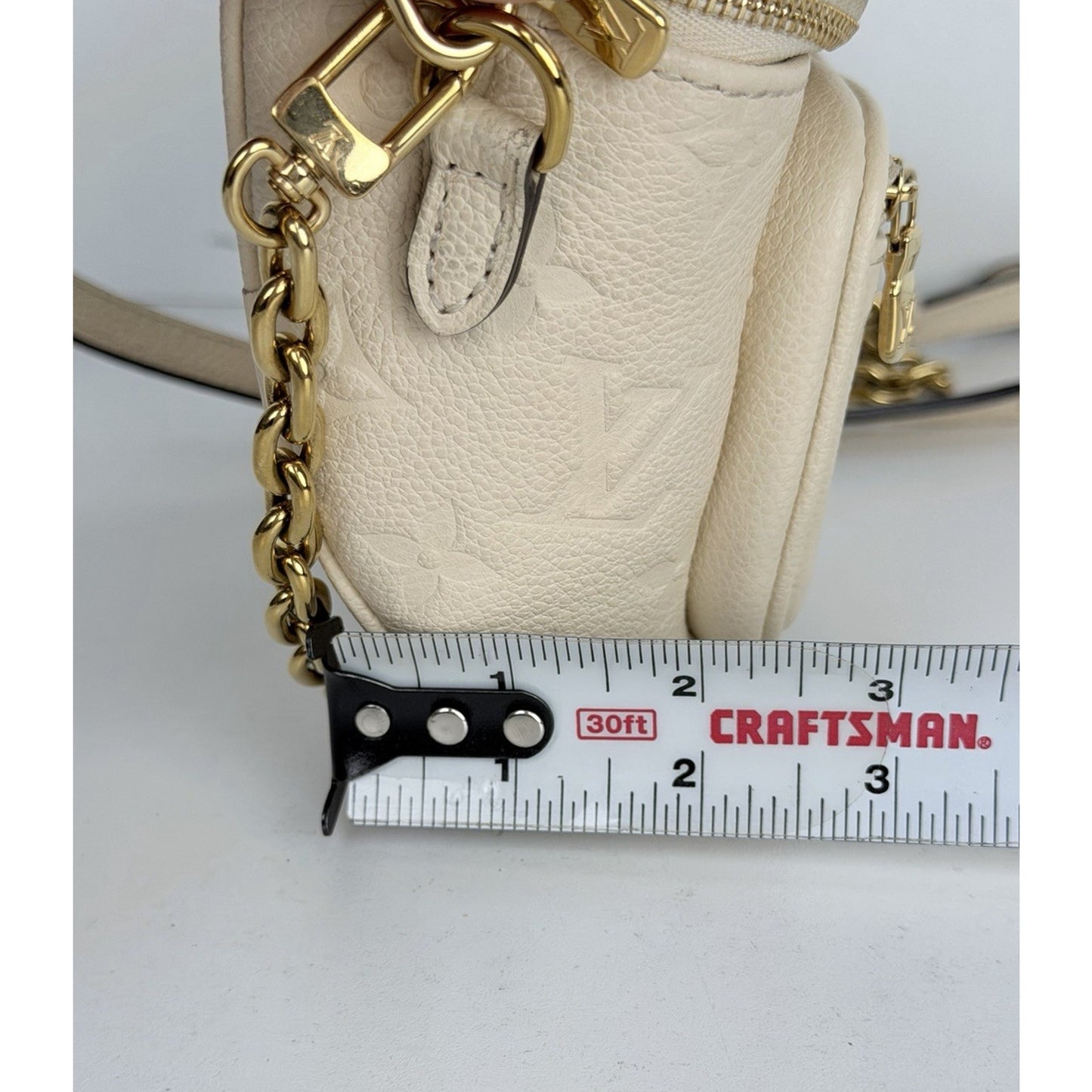 Louis Vuitton Mini Bumbag in Cream Embossed Monogram Empreinte Leather NFC U1