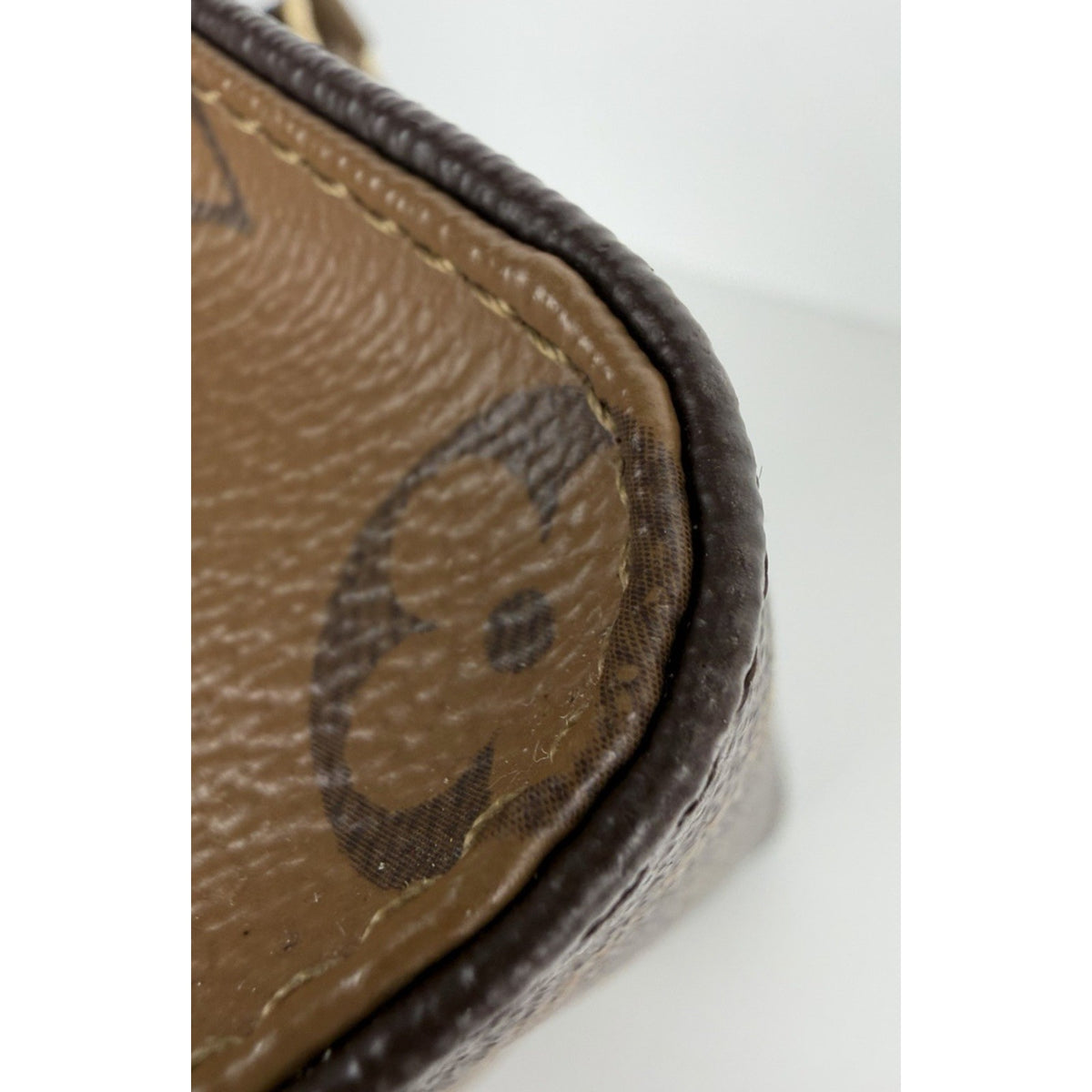 Louis Vuitton OnTheGo East West HandBag Monogram Reverse Brown Canvas NFC E2