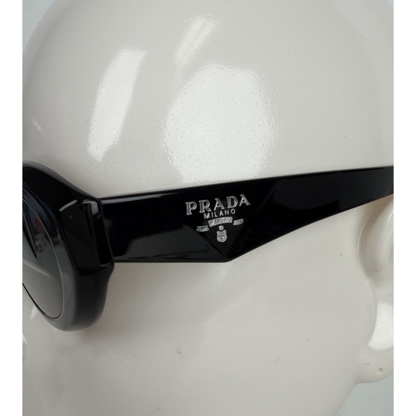 Prada Symbole Oval Car-Eye Sunglasses 55 in Black with Dark Gray Lenses