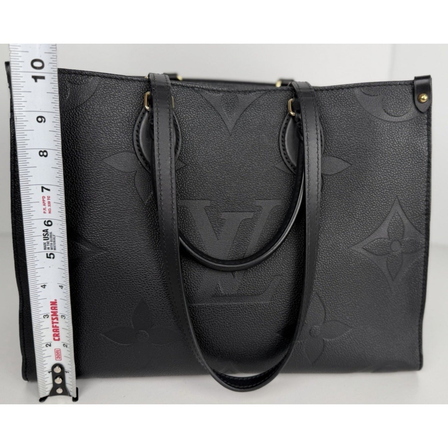 Louis Vuitton OnTheGo MM Bag Tote in Black Leather Embossed Monogram NFC F1