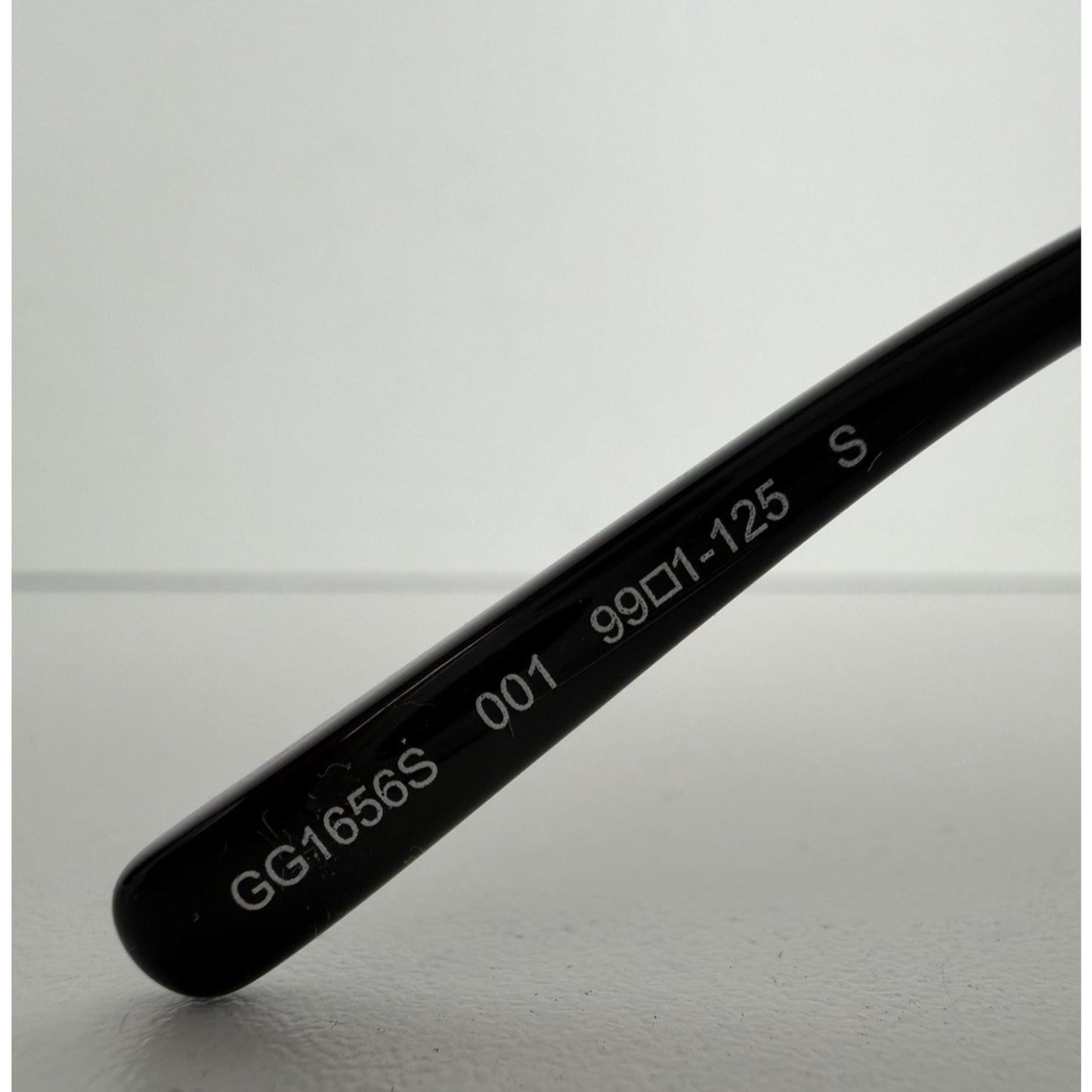 Gucci GG1656S 001 Sunglasses in Black Metal Frame and Grey Tinted Lenses