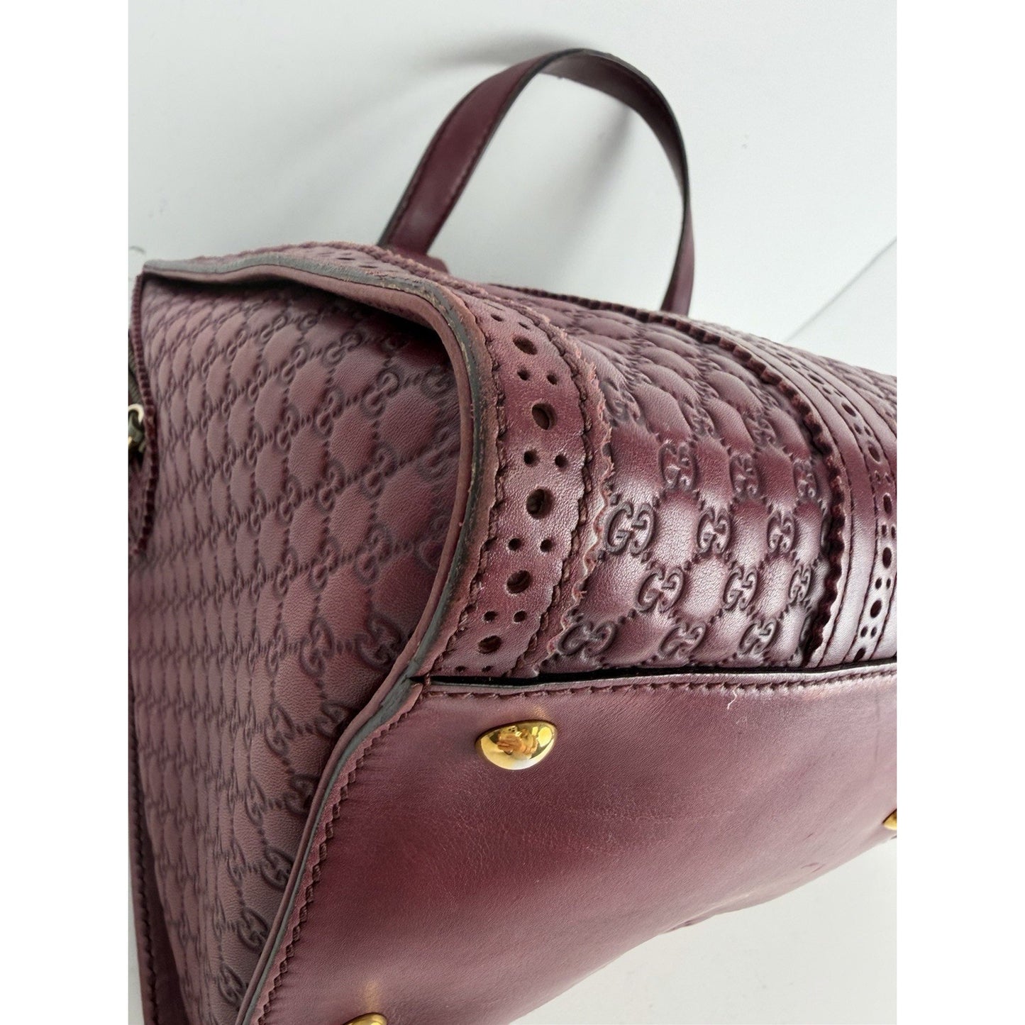 Gucci Duilio Brogue Boston Bag in Burgundy Microguccissima Embossed Leather S-16