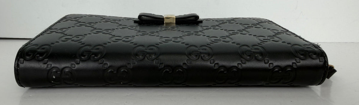 Gucci Guccissima Bow Zip Around Wallet in Black Leather Y
