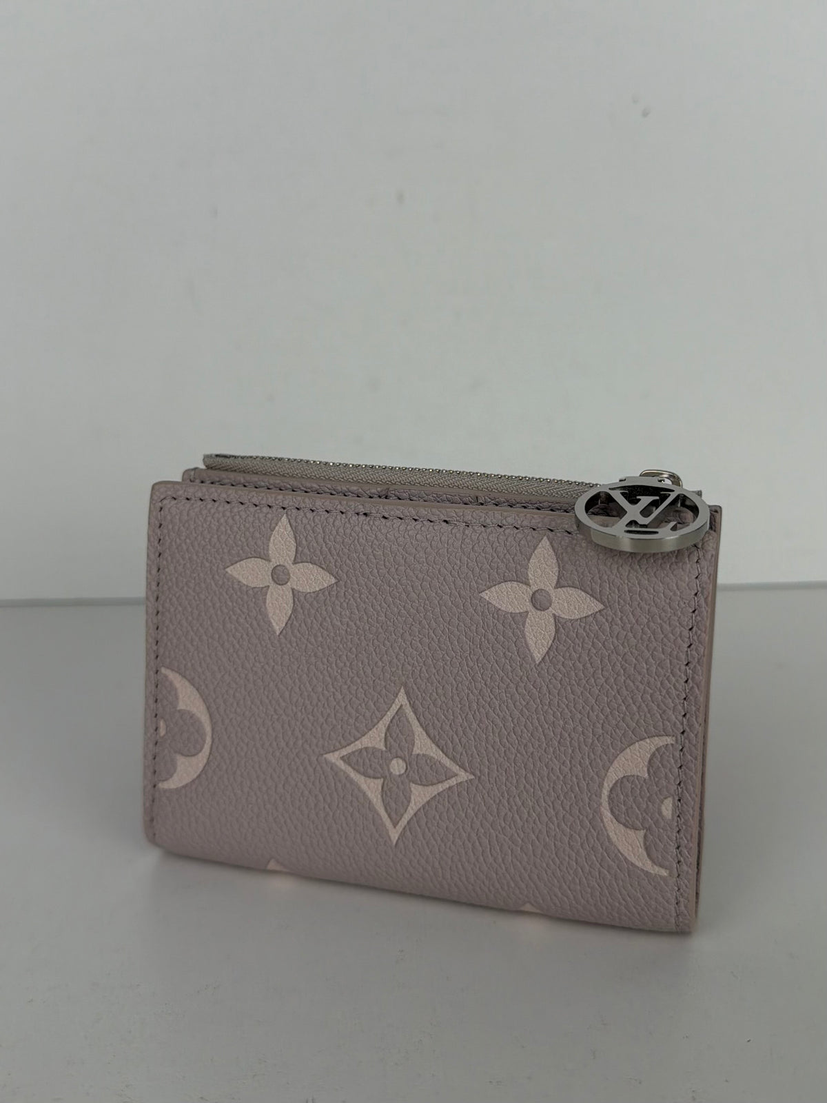 Louis Vuitton Lisa Wallet in Dust Pink Empreinte Leather NFC K-3