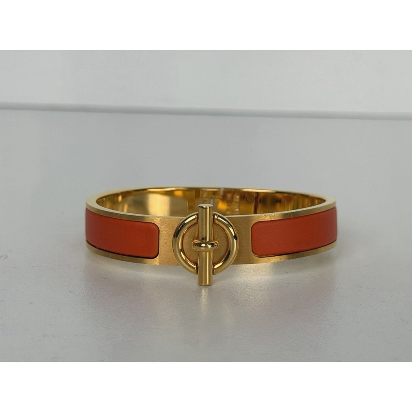 Hermes Clic H Bracelet in Orange Enamel
