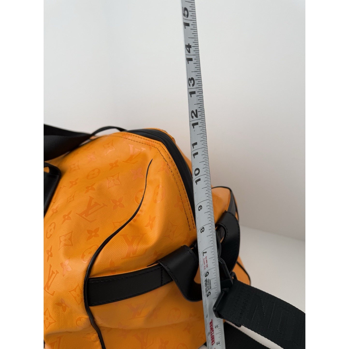 Louis Vuitton Ski Monogram Storm Coated Orange Canvas Keepall Sport