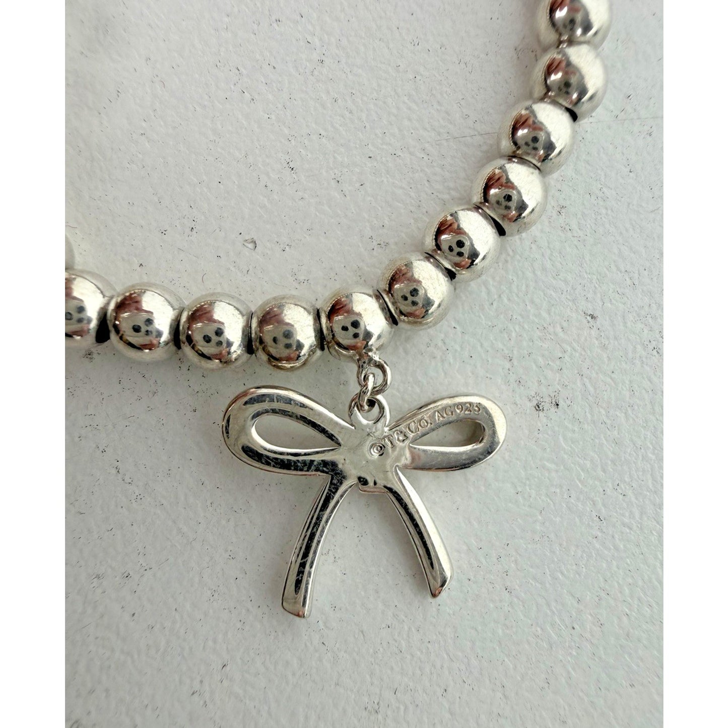 Tiffany & Co. Sterling Silver Bow Charm Beaded Bracelet