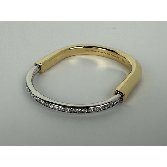 TIFFANY & Co. Lock Bangle in Yellow and White Gold with Half Pavé Diamonds