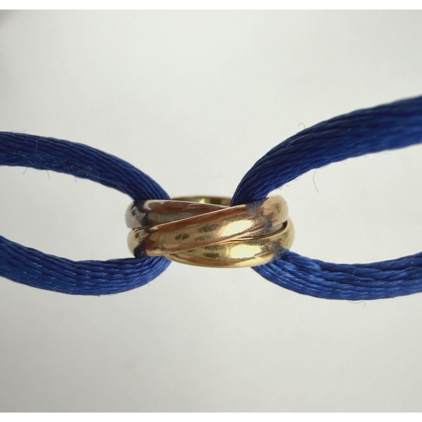Cartier Cord Trinity Bracelet in 18K Tri-Color Gold & Blue Silk