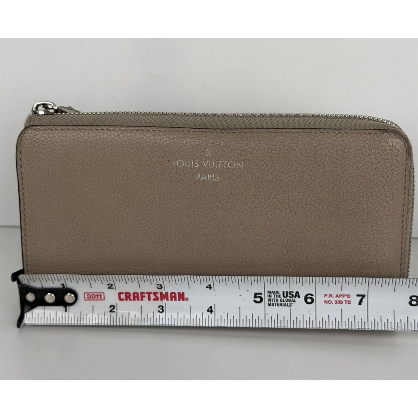 Louis Vuitton Comete Wallet in Galet (Beige) Taurillon Leather 2016