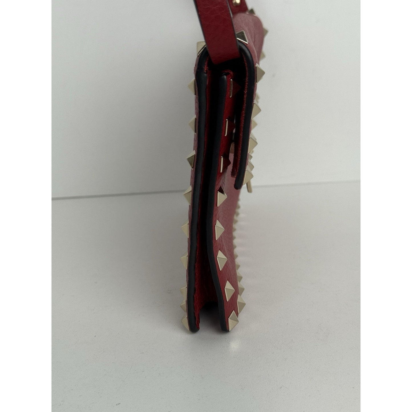 VALENTINO GARAVANI Pebbled Calfskin Medium Rockstud Rouge