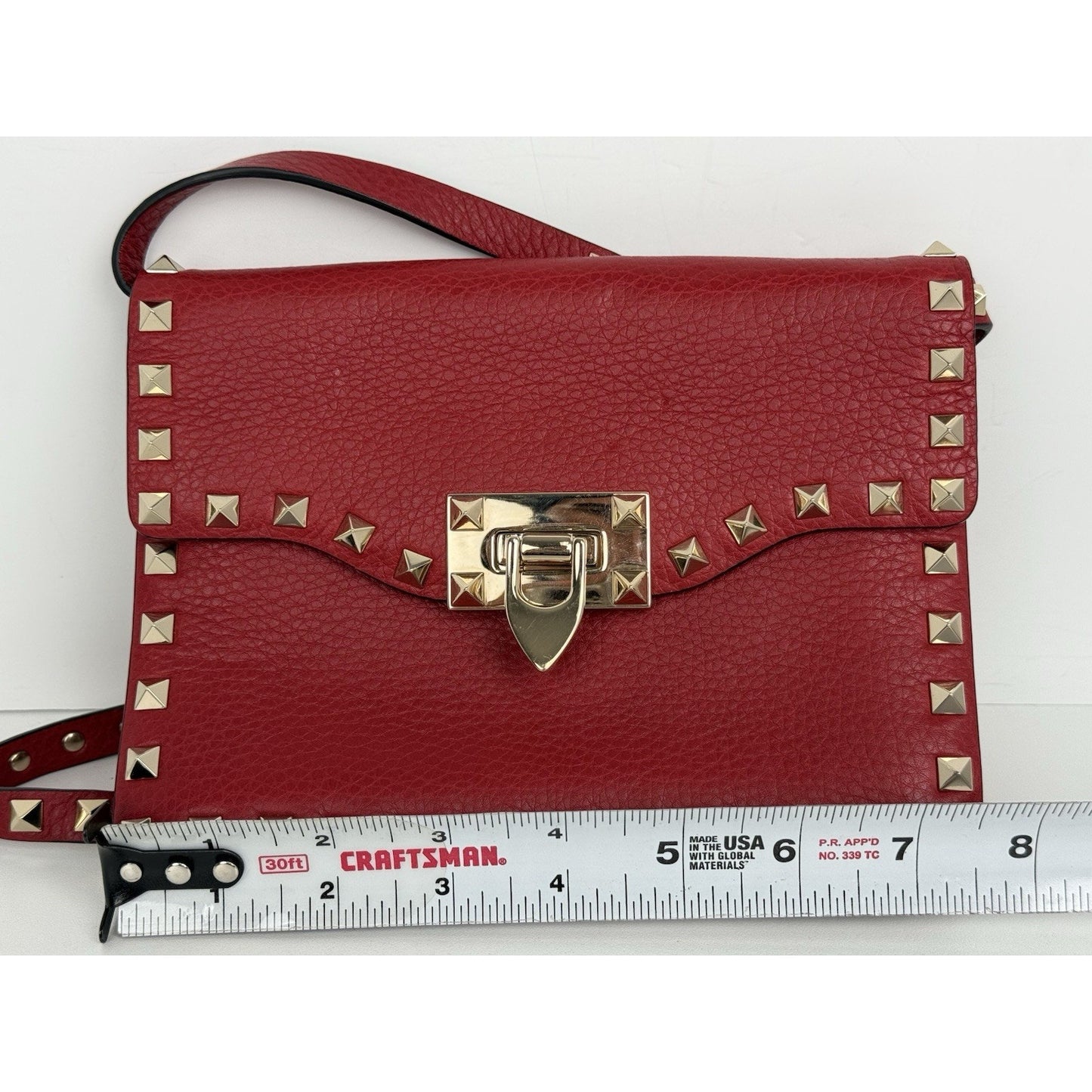 VALENTINO GARAVANI Pebbled Calfskin Medium Rockstud Rouge Pur