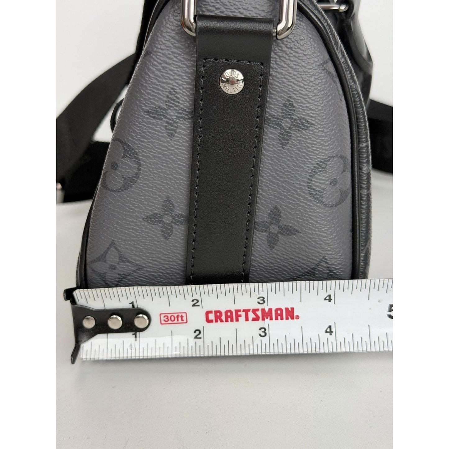 Louis Vuitton Keepall Bandouliere 25 Reverse Monogram Eclipse Canvas Microchipped