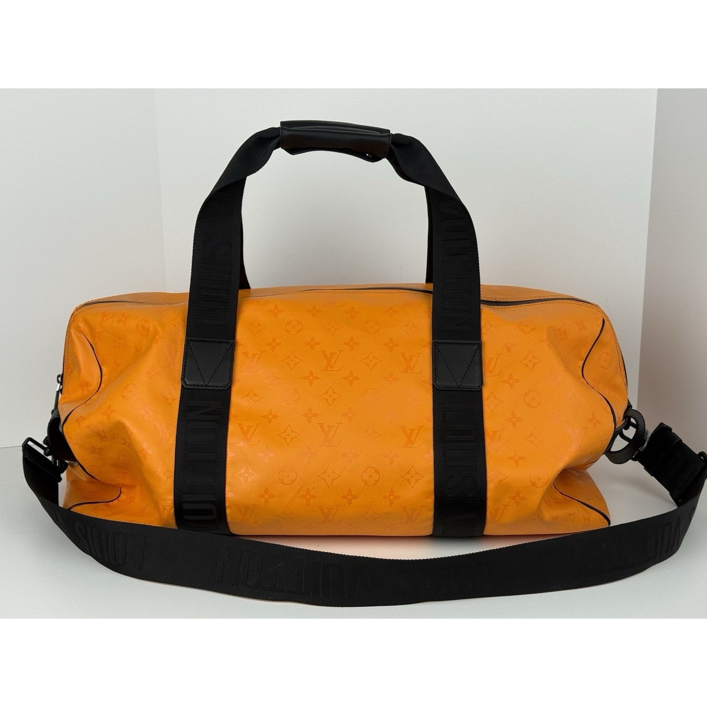 Louis Vuitton Ski Monogram Storm Coated Orange Canvas Keepall Sport