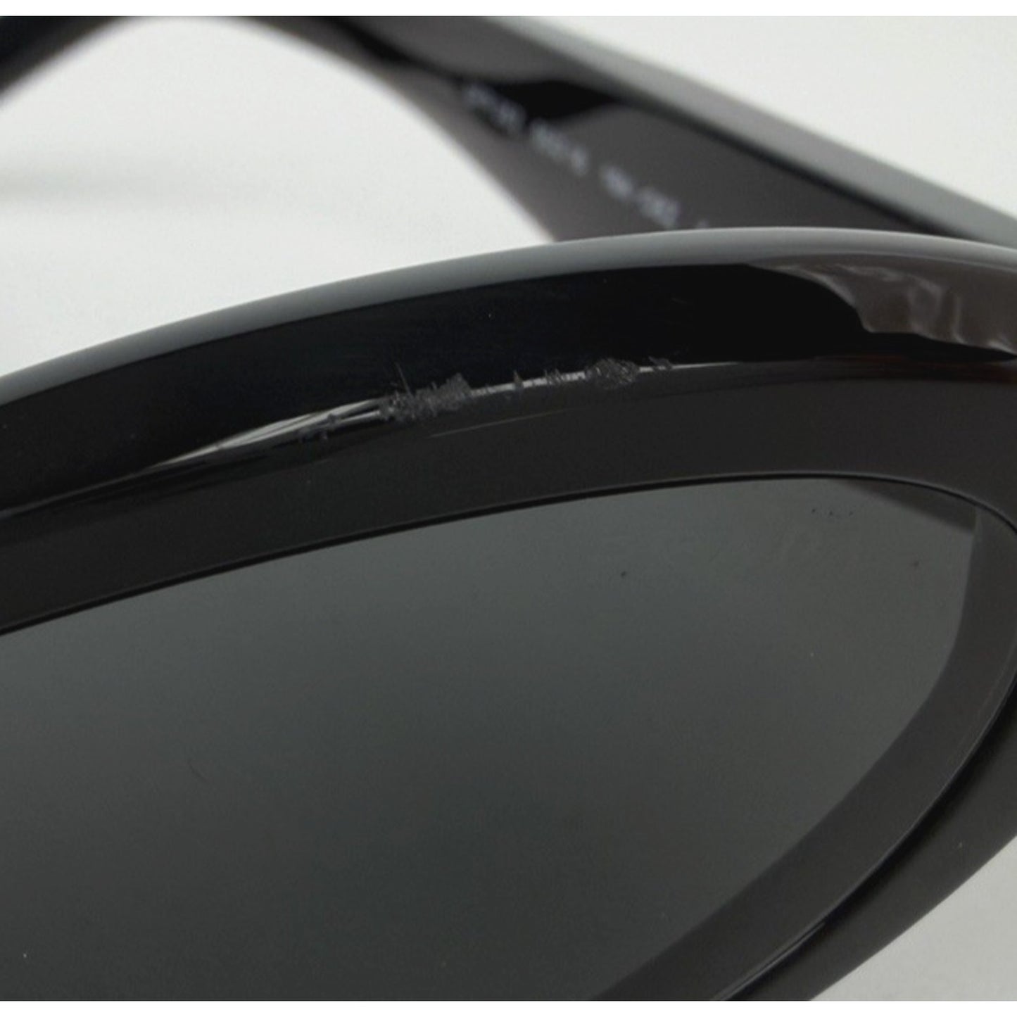 Prada Symbole Oval Car-Eye Sunglasses 55 in Black with Dark Gray Lenses