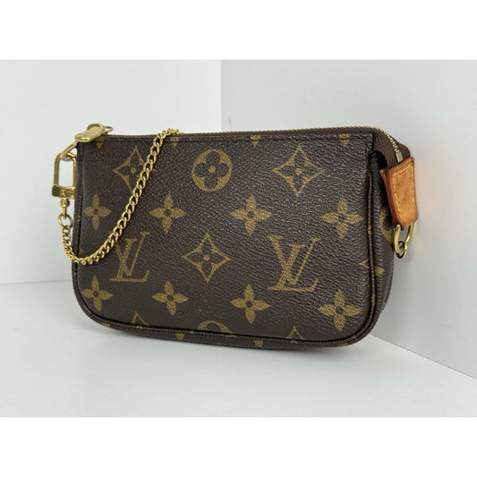 Louis Vuitton Mini Pochette Accessoires Monogram Canvas Brown with Gold Hardware